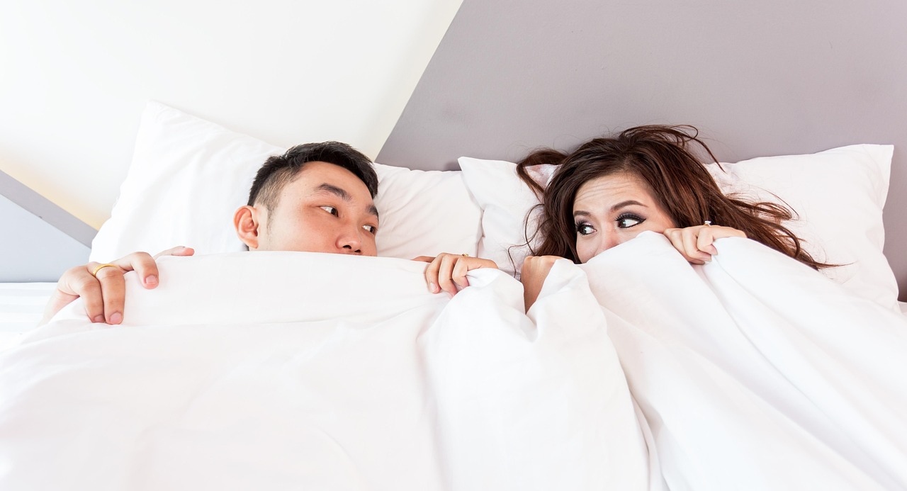 Couple happy in bed after increasing stamina